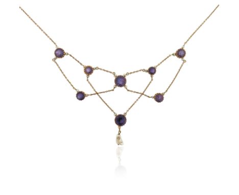 An Edwardian amethyst and seed pearl necklace, suspending circular-cut amethysts and seed pearls on fine-link yellow gold nec