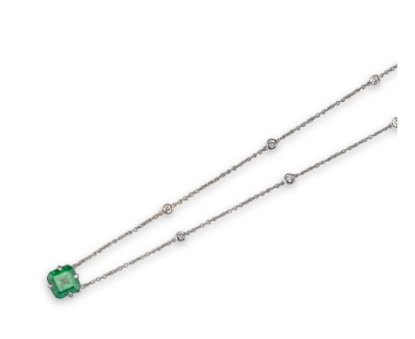 An emerald and diamond necklace, set with an emerald-cut emerald, on a fine-link white gold neck chain set with round brillia