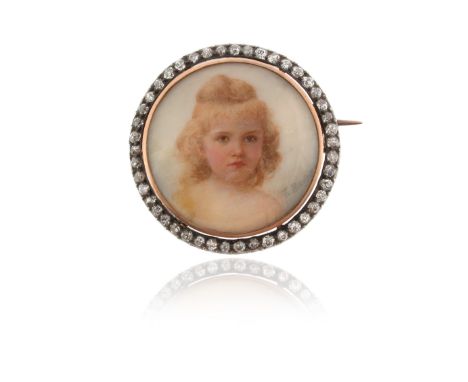 A late Victorian diamond-set portrait brooch, depicting a young girl within glazed locket compartment, mounted on mother-of-p