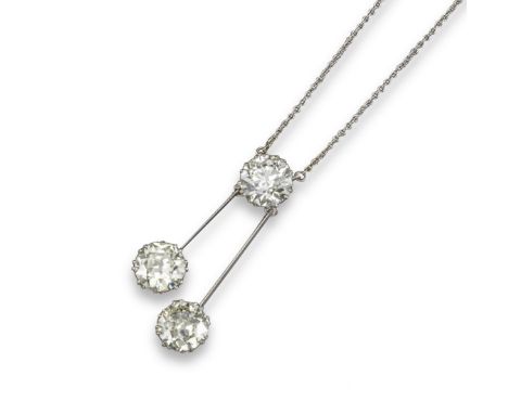 A diamond lavalier, the three old circular-cut diamonds weigh approximately 10.50cts in total, set in platinum and joined wit