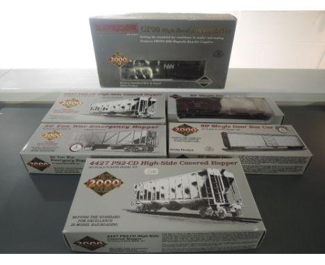 A Proto 2000 Series Limited Edition HO Scale NW GP30 High Hood Locomotive, boxed along with 5 Wagons, also boxed