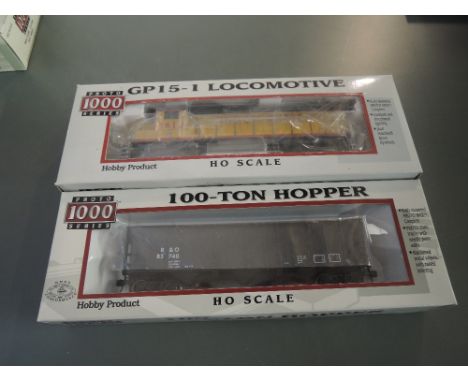 Two Proto 1000 Series HO Scale Union Pacific GP15-1 Locomotive &amp; 100 Ton Hopper Wagon, both boxed