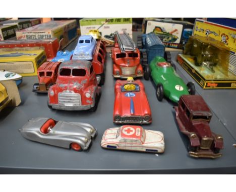 A collection of tin plate and pressed steel vehicles comprising, Marx Saloon Car, Vanwall Racing Car, Triang clockwork RAF Tr