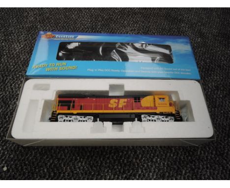 A Broadway Limited Blueline HO scale GE C30-7 ATSF Locomotive 8018, in original box 5042