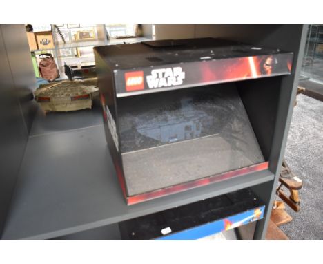 A Lego Star Wars Shop Display box containing a First Order Transporter, made up