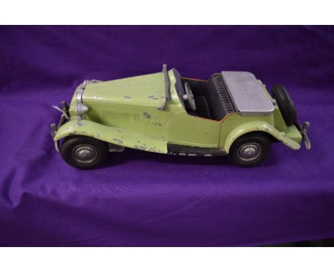 A 1950's Large Scale Kit Model of a MG TD in green made by Chas. WM. Doepke Manufacturing Co of Rossmore Ohio, USA, having wo