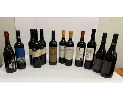 Twelve assorted Red Wines to include PepperJack Shiraz 2021, The Pig Cut 2016, Kaiken Classico 2021, Franz Haas 2019, Echappe