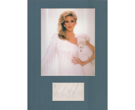 Actor, Morgan Fairchild matted signature piece, overall size 16x12. This beautiful item features a colour photo and a signed 