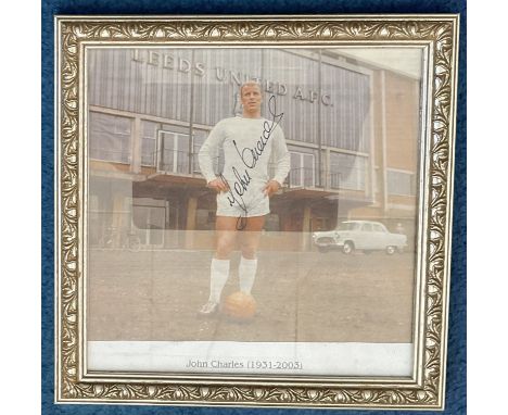 Football, John Charles signed framed colour photo pictured outside Elland Road for Leeds. Overall size approx. 9x9, signed in