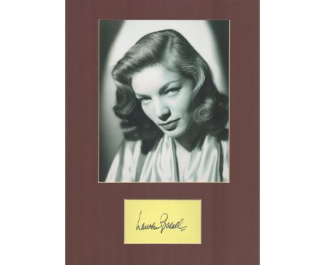 Actor, Lauren Bacall matted signature piece, overall size 16x12. This beautiful item features a black and white photo and a s
