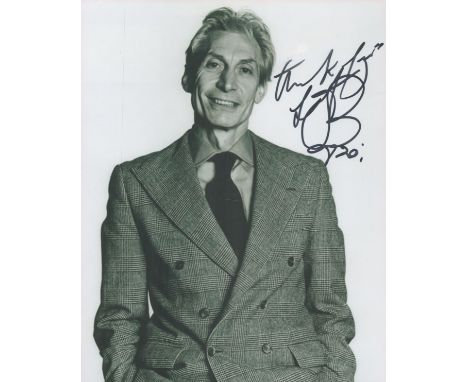 Charlie Watts signed 10x8 black and white photo. Watts was an English musician who achieved international fame as the drummer