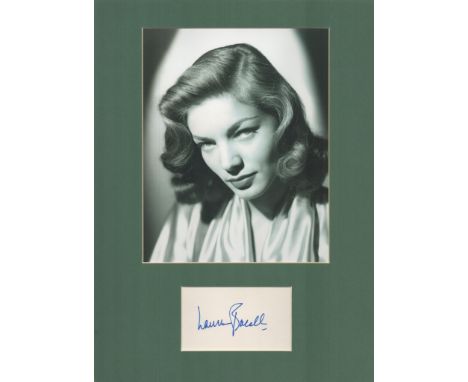 Actor, Lauren Bacall matted signature piece, overall size 16x12. This beautiful item features a black and white photo and a s