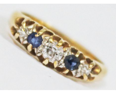 A diamond sapphire ring, marked '18ct', gross wt. 2.6g, size K.