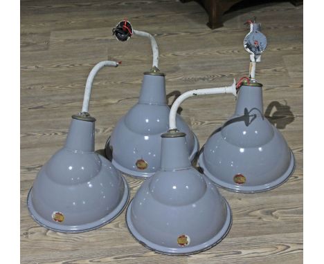 A set of four grey and white enamel industrial light fittings labelled 'Benzamin Parabolic Angle', diam. 33cm each. 