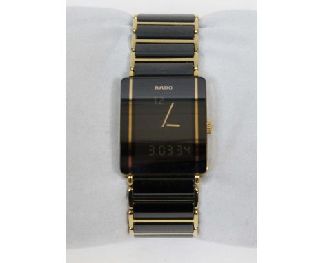 A gent's Rado titanium quartz wristwatch with box.
