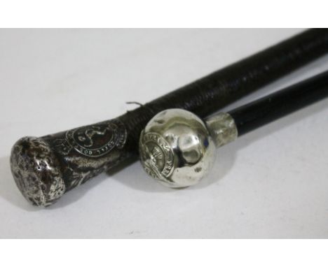 An RAF swagger stick and a Royal Corps of Signals riding whip.