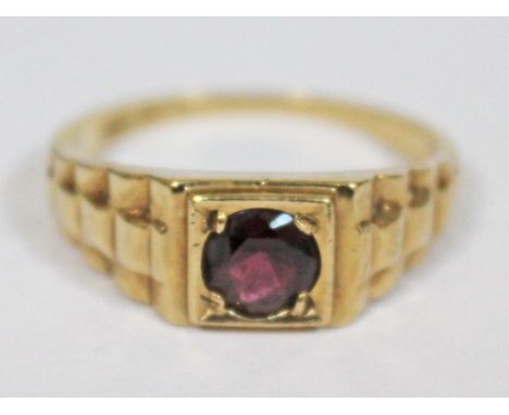 A gent's single stone amethyst ring, marked '375', gross wt. 4.4g, size W, with box.