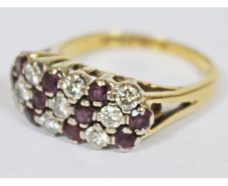 An 18ct gold diamond amethyst ring, hallmarked, gross wt. 5g, size M.