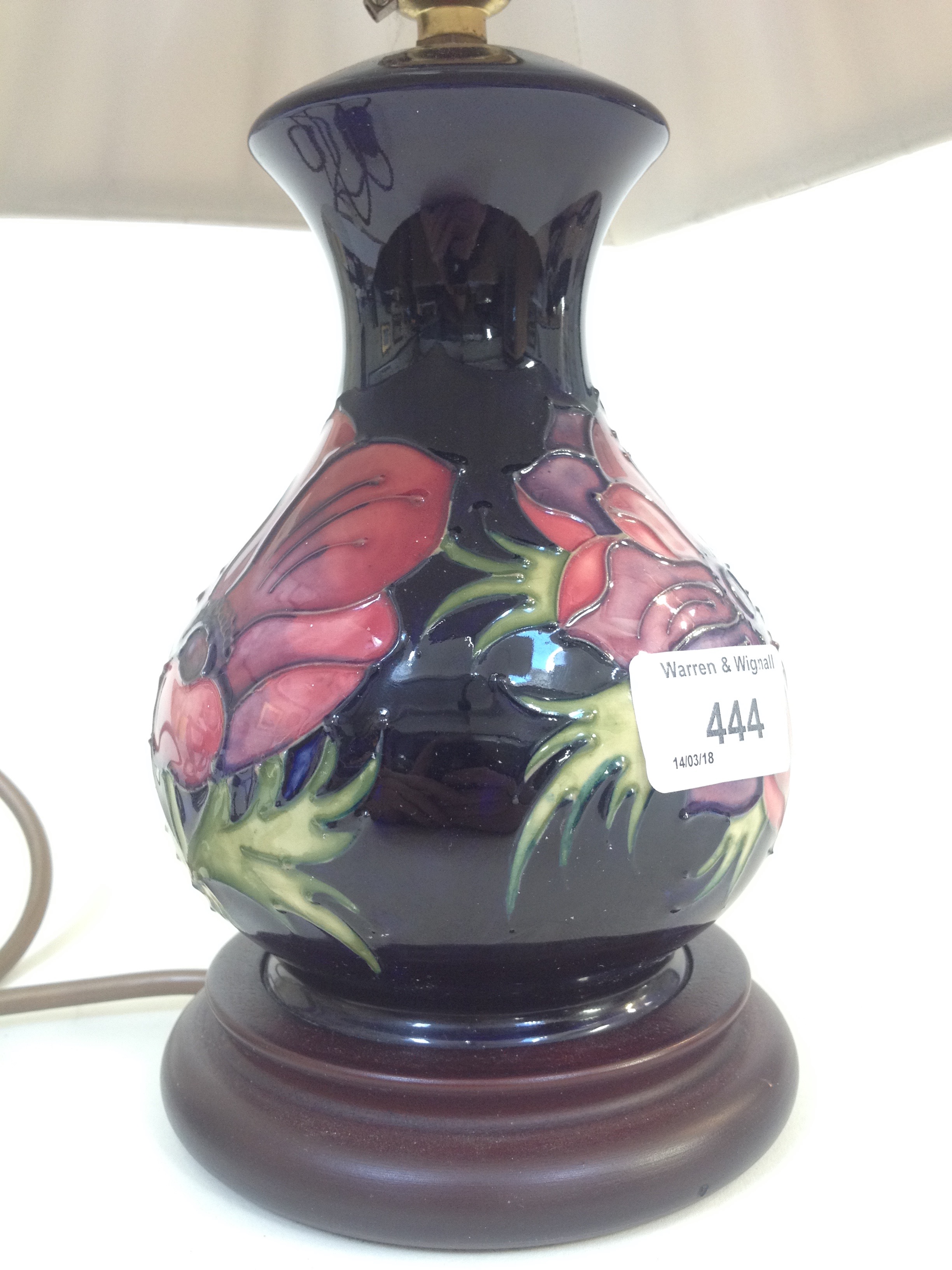 Two Moorcroft pottery table lamps, height 33cm & 39cm (including shades).