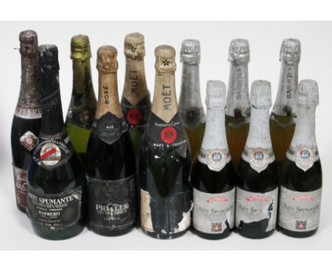 13 bottles of sparkling wine including Asti Spumante, Moet & Chandon, Bassereau, Pigalle Rose, Moscato, Vernay and Freixenet.