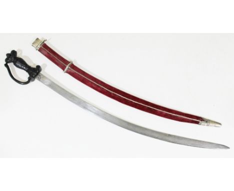 An Indo-Persian Tulwar sword having jewelled cabochon 75cm curved blade with koftgari gold inscribed panel, black lava hard s