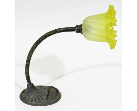 A cast metal angle lamp with lemon yellow crimped glass shade, cast 'Supreme British Made 1018' in relief to base.