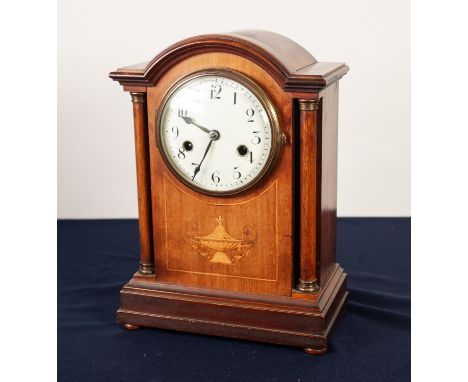 EDWARDIAN INLAID MAHOGANY MANTLE CLOCK, the 4 ½” enamelled Arabic dial powered by an eight day movement striking on a gong, a