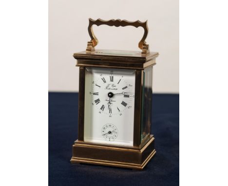 A MODERN FRENCH BRASS CASED CARRIAGE CLOCK with alarm, the white enamel Roman dial inscribed 'L'Epee, Fondee en 1839, Sainte 