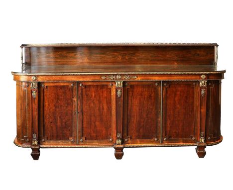 A Good Regency Rosewood and Gilt Metal-Mounted Sideboard, early 19th century, the superstructure with pierced brass gallery a