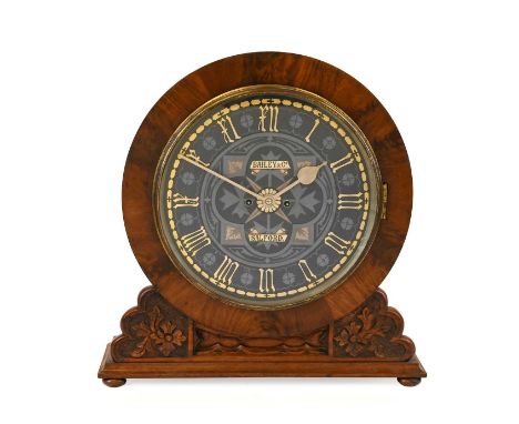 A Mahogany Striking Gothic Revival Table Clock, signed Bailey &amp; Co, Salford, circa 1880, case with a carved floral front 