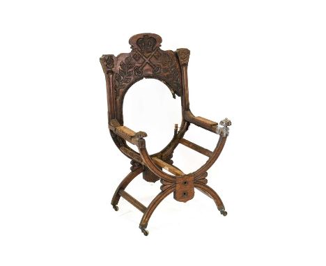 A Mid 19th Century Carved Oak Savonarola Style Armchair, the back support carved as the coat of arms for the Archbishop of Yo