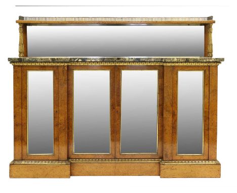 A Regency Amboyna and Parcel Gilt Breakfront Chiffonier, early 19th century, with pierced three-quarter gallery above a narro