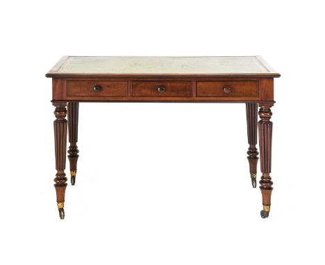 A William IV Mahogany Writing Table, 2nd quarter 19th century, with green and gilt leather writing surface above three mahoga