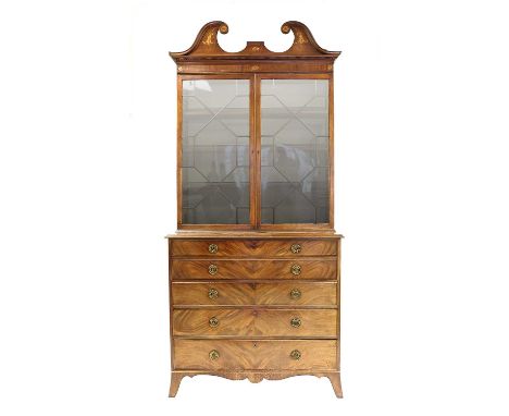 A Hepplewhite Period Mahogany Secretaire Bookcase, circa 1770, the swan neck pediment inlaid with marquetry roundels and acan