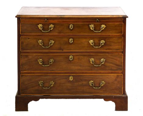 A George III Mahogany and Boxwood-Strung Straight Front Bachelor's Chest, late 18th century, the moulded top above a pull-out