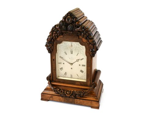 A Good Victorian Walnut Carved Quarter Chiming Bracket Clock, signed George Hammond, Manchester, circa 1850, arched pediment 