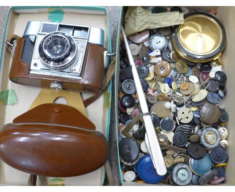 A box of buttons, buckles, compact and an Agfa film camera