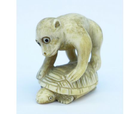 A carved ivory netsuke