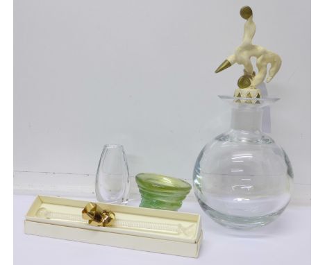 A glass acrobat flask by Jean Goggio, signed, a/f, a Murano cocktail stick, Kosta, vase, etc.