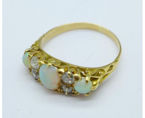 An 18ct gold, opal and diamond ring, opal a/f, 3.9g, R