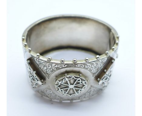 A Victorian white metal bangle, 40g