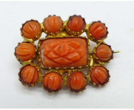 A coral brooch