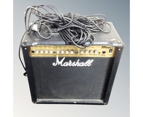 A Marshall MG series 50 DFX amplifier with leads.