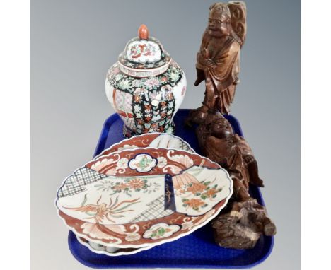 A tray containing a pair Chinese Imari oval scalloped edge dishes together with a further lidded vase and two carved hardwood