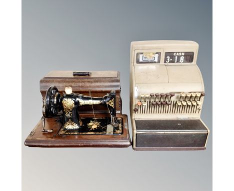 A vintage Jeller cash register together with a Jones hand sewing machine in case.