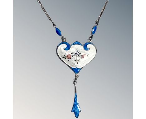 An early 20th century silver and enamel pendant on chain
