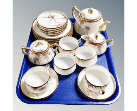 A 20 piece 20th century Japanese export eggshell tea service.