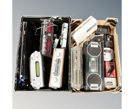 Two boxes containing vintage and later radios, Toshiba DVD player, assorted Walkmans.