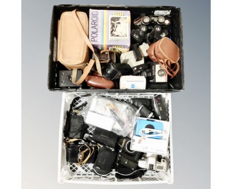 Two boxes containing vintage and digital cameras, field glasses including Mark Scheffel.