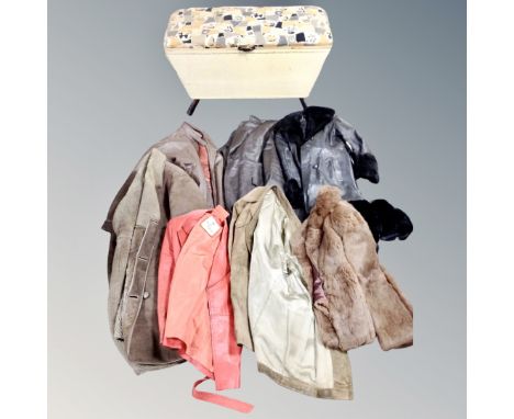 A mid century loom blanket box on raised legs together with seven vintage fur, leather and sheep skin coats  (af)